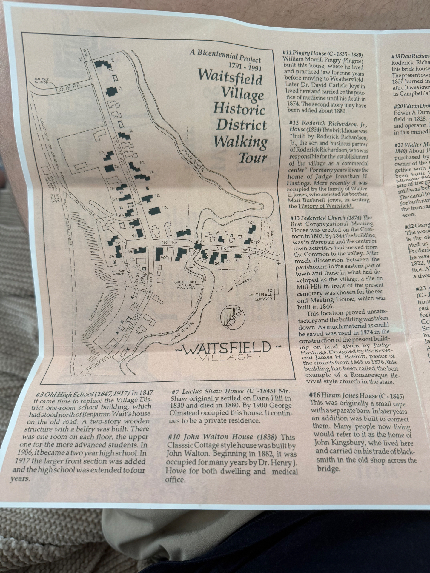 Hand-drawn map of Waitsfield Village showing Bridge Street, VT Route 100, the Mad River and Great Eddy, the mill site, the escarpment, and numbered walking tour stops