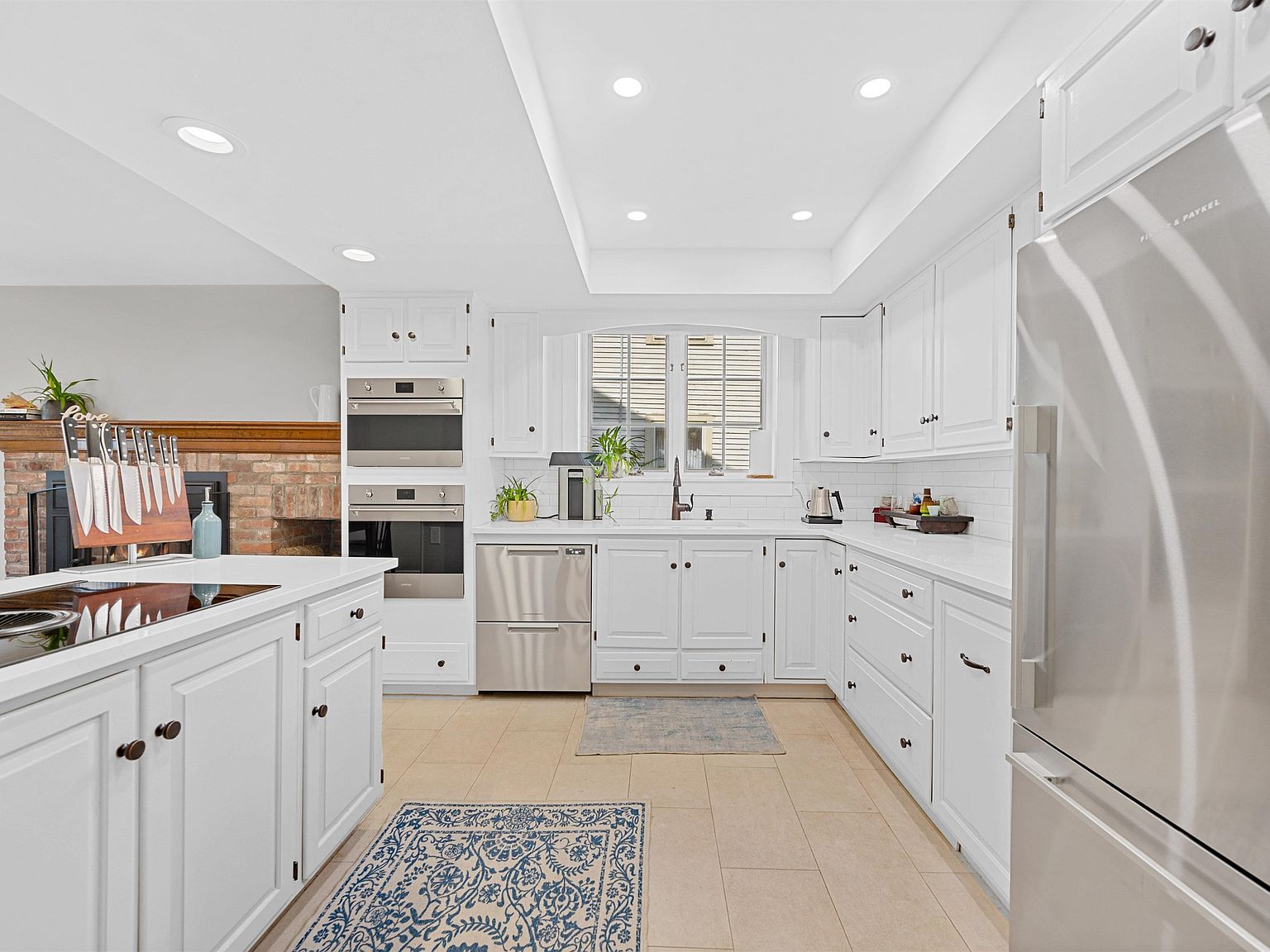 White kitchen with double ovens